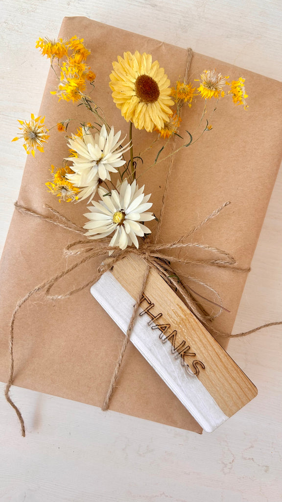 yellow gift posy on present